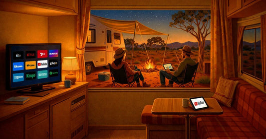 Caravan interior with streaming apps on TV and couple watching campfire in the outback at night