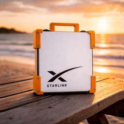 Maxi Orange Starlink Mini Magnetic Mount on timber table at Australian beach sunset - portable satellite dish carry frame by Dishy Mini Mounts
