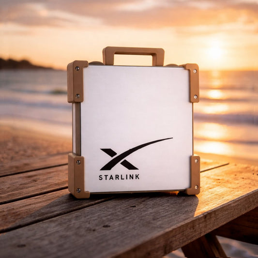 Sand Storm Starlink Mini Magnetic Mount on timber table at Australian beach sunset - portable satellite dish carry frame by Dishy Mini Mounts