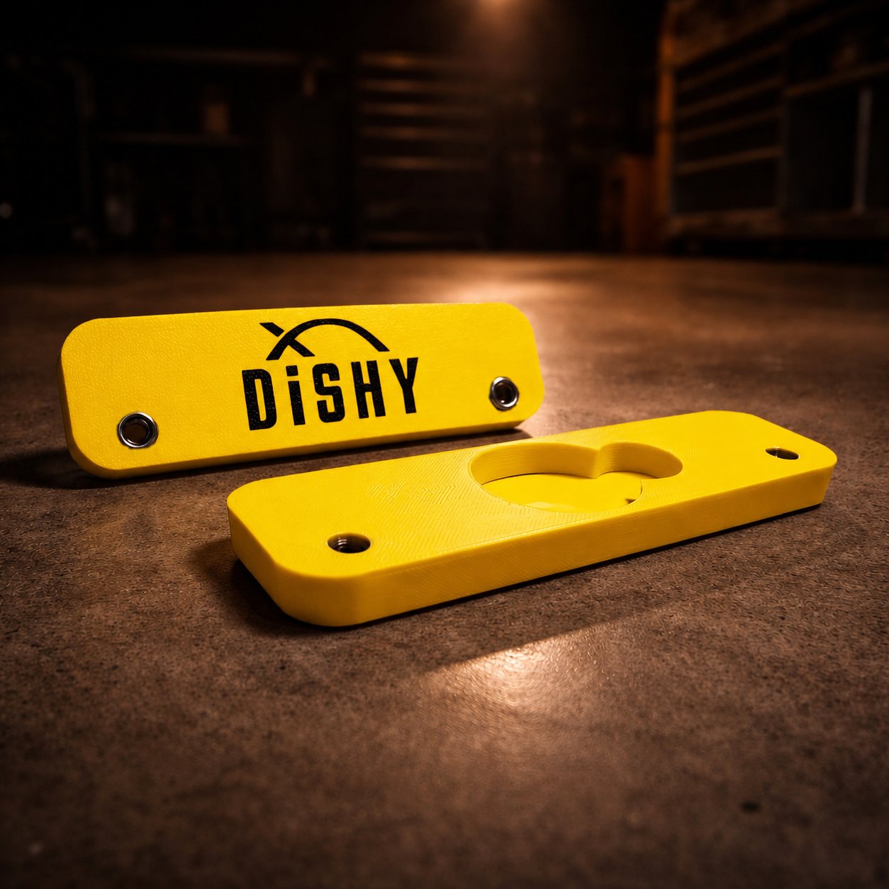 Dishy Mini Mounts AirTag holder Yellow - showing Dishy logo and hidden AirTag recess
